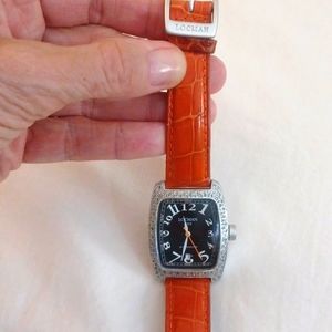 Ladies Locman watch with diamonds working great.Original alligator band.